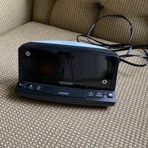 Sharp digital alarm clock
